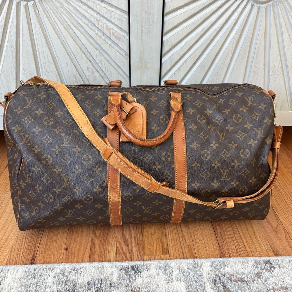 Authentic Louis Vuitton keepall 55 bandouliere travel unisex with strap duffle